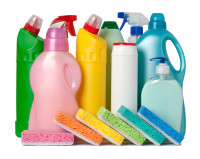 Colorful containers with cleaning supplies